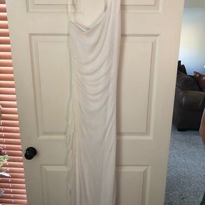 One shoulder full length dress with gold specs.